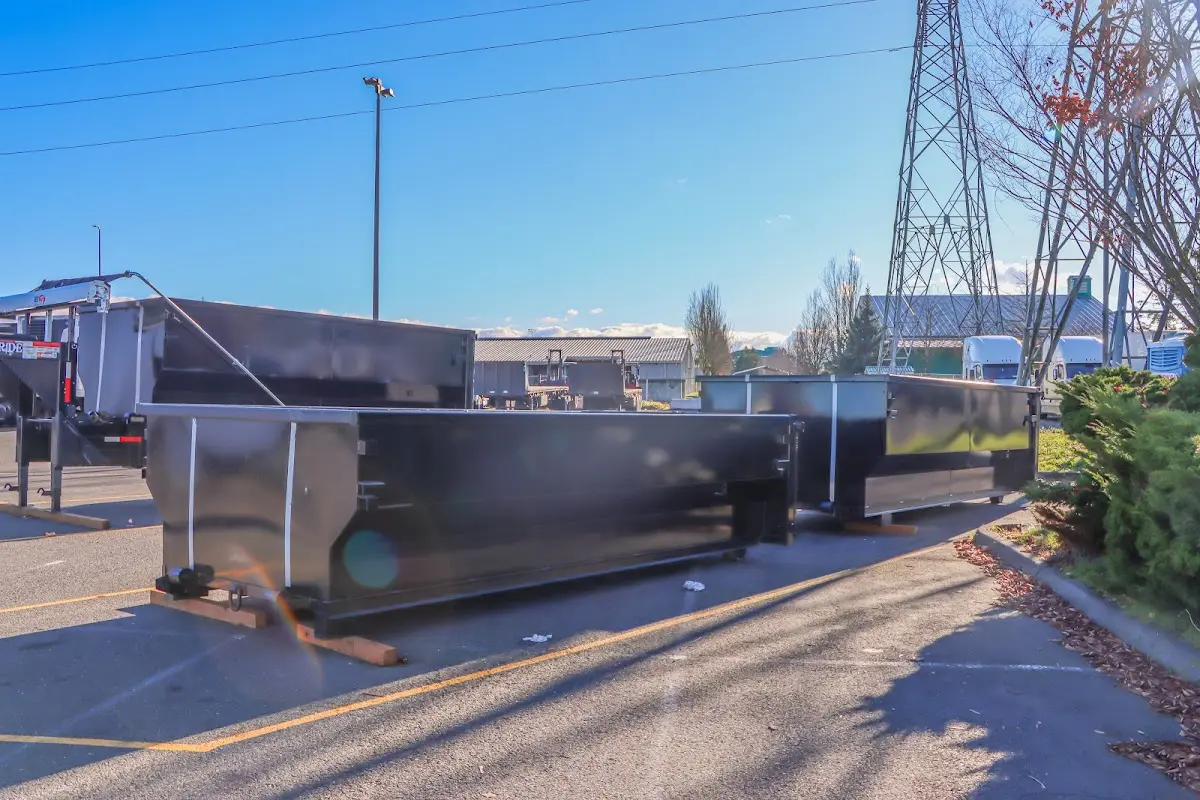 Roll-off dumpster ready for waste disposal at job site for 2 Yard Dumpster Rental in Pinellas Park